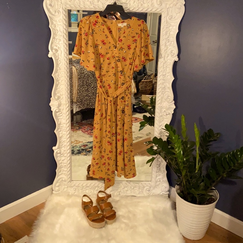This is a cute mustard yellow floral dress!